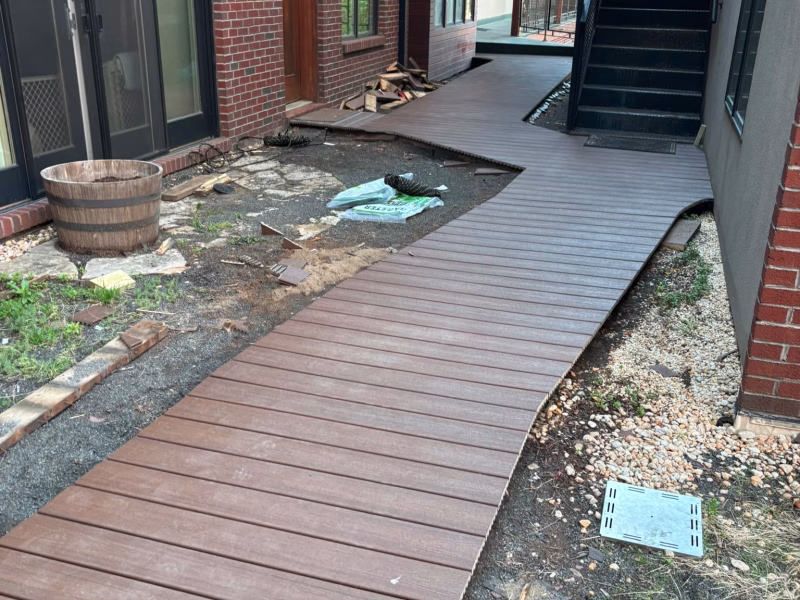Floating Timber Walkway Connecting Home to Patio